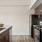 a kitchen with a sink and a stove