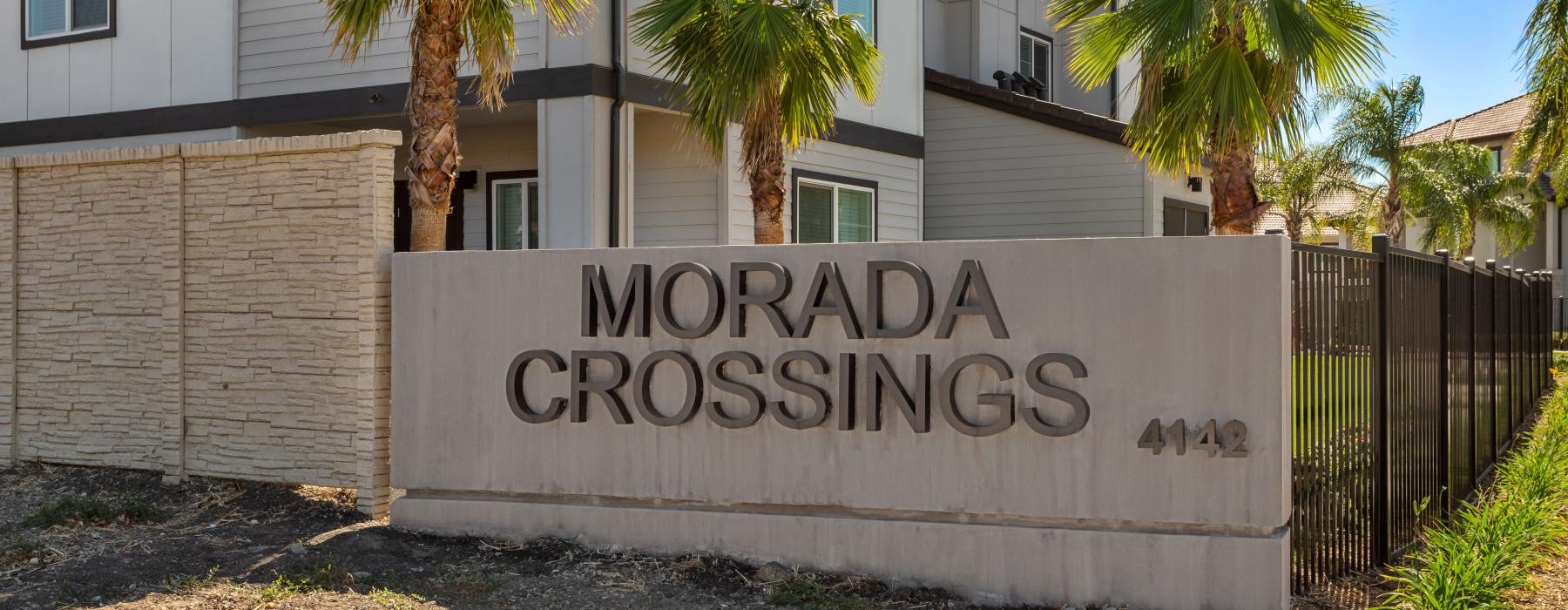 a sign in front of a building