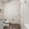 a bathroom with a tub toilet and sink