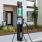 an EV charging station on the sidewalk