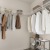 a room with a rack of clothes