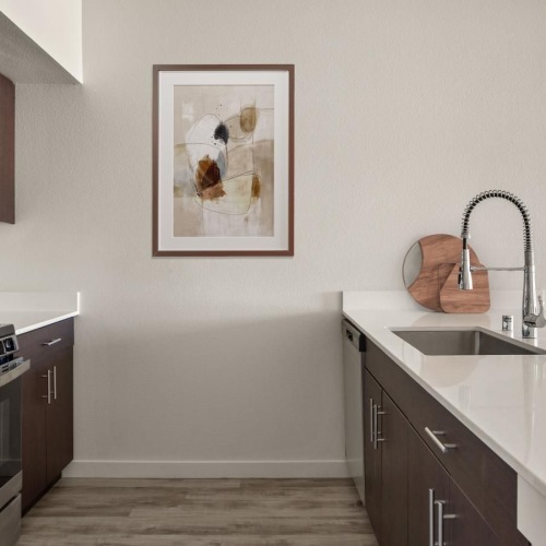Spacious kitchens with thoughtful details a kitchen with a sink and a stove