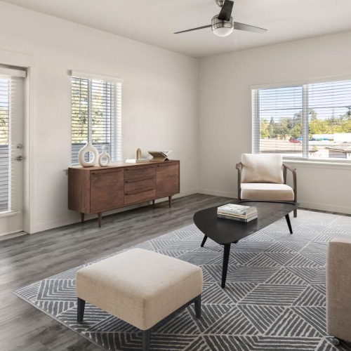 Wide open living areas flooded with natural light a living room with a couch and a table
