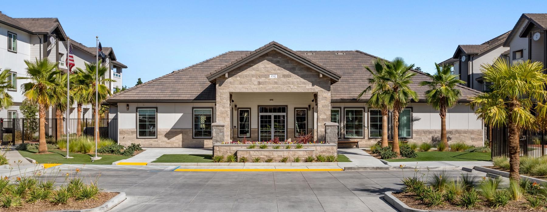 a building with palm trees